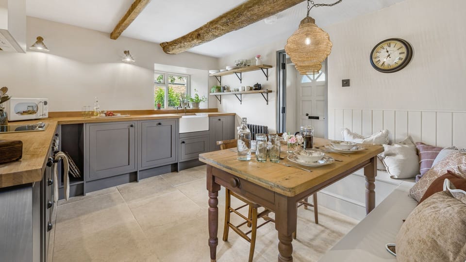 This newly renovated cottage retains its historical character through its tasteful decor and furnishings.