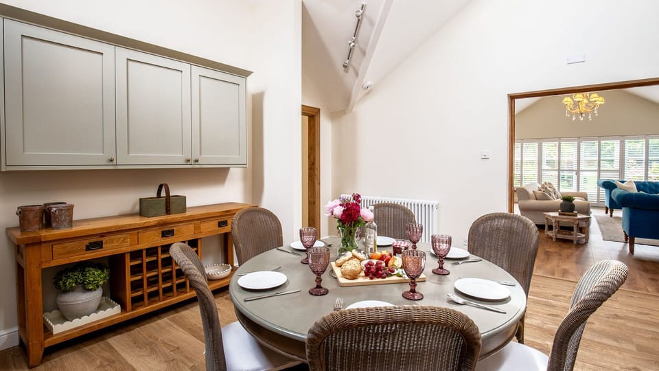 The large kitchen has a dining table seating 6 perfect for group or family meals