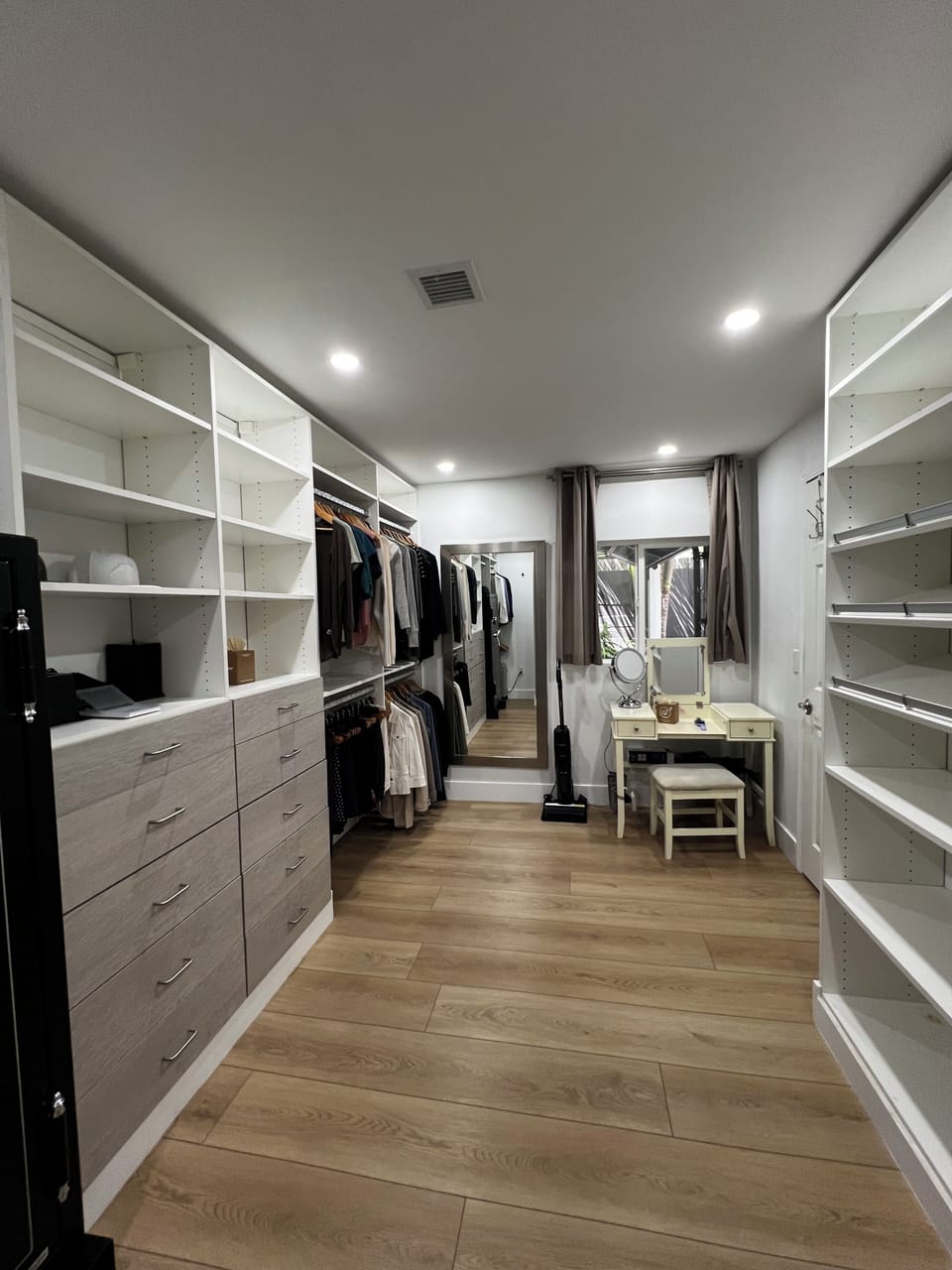 Master walk in closet with vanity