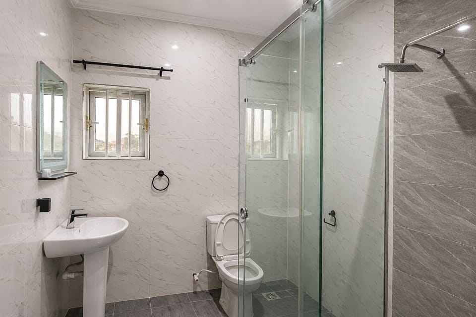 Deluxe Single Room, City View | Bathroom | Shower, towels, soap, toilet paper