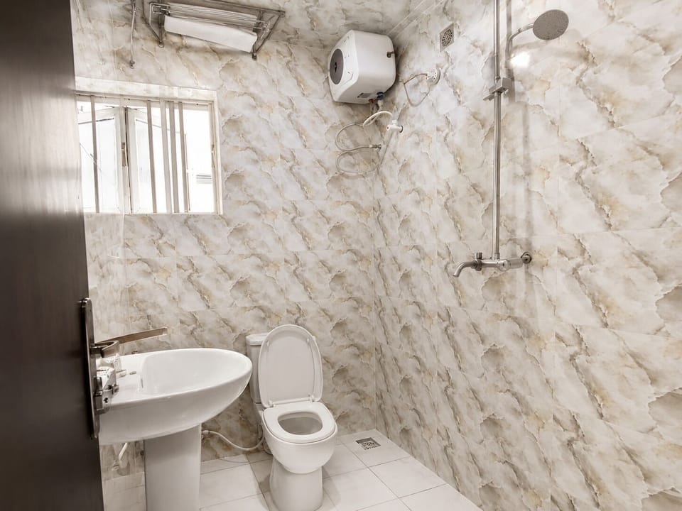 Standard Condo, Courtyard View | Bathroom | Shower, towels, soap, toilet paper