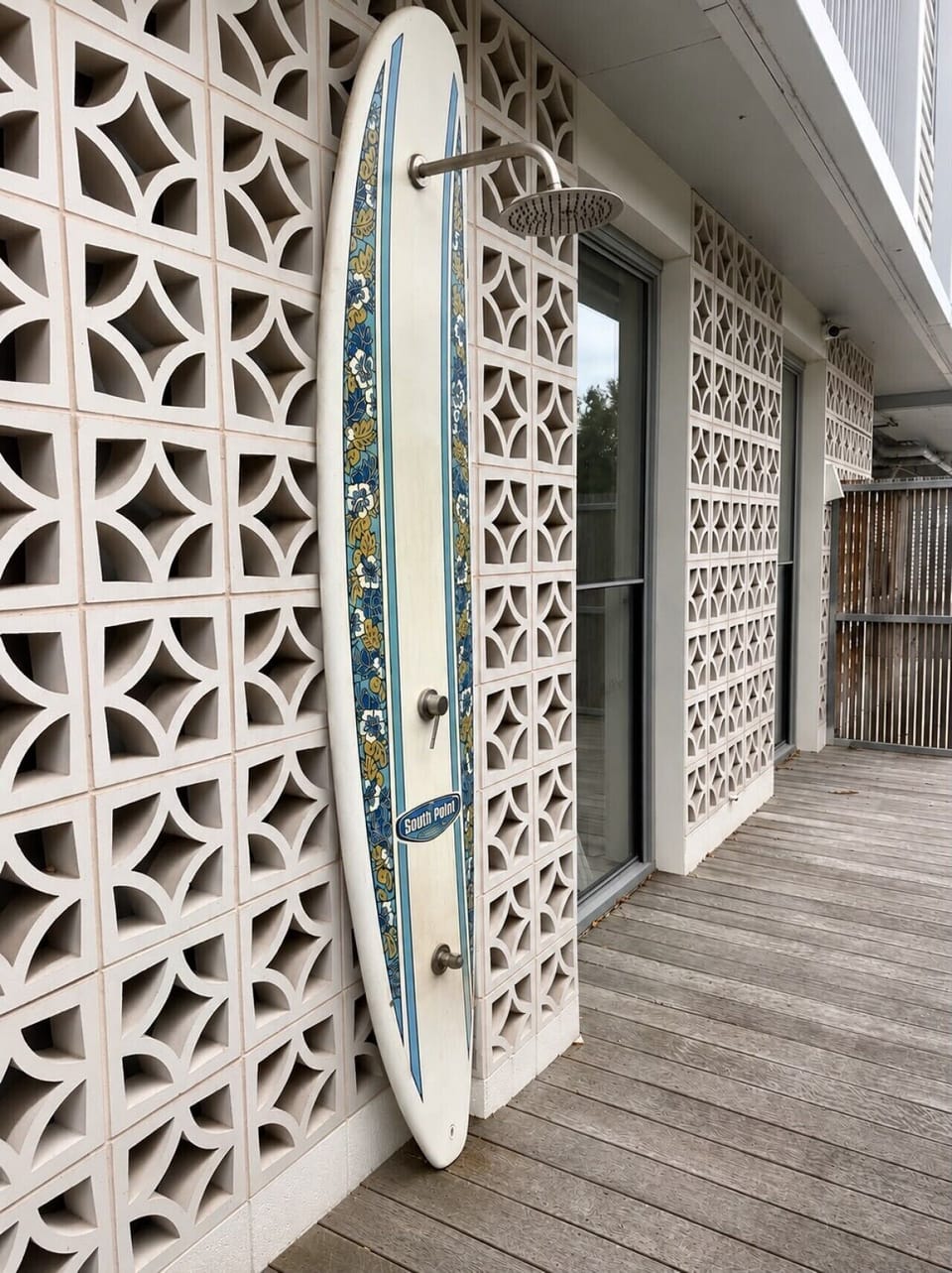 Unique private entrance with charming architectural details, offering convenient access to the peaceful courtyard and outdoor spaces.