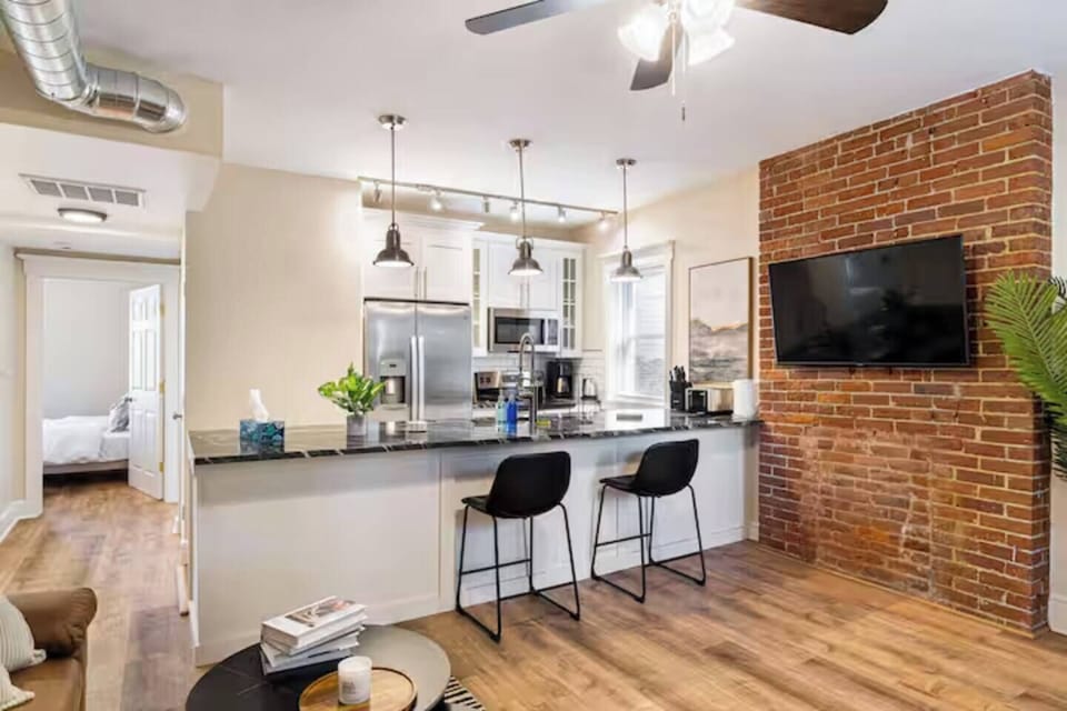 Bright, modern, and inviting, this open living area is designed for comfort, connection, and memorable stays.