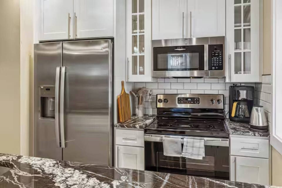 Fully equipped with modern stainless steel appliances and everything you need to cook, dine, and feel at home.