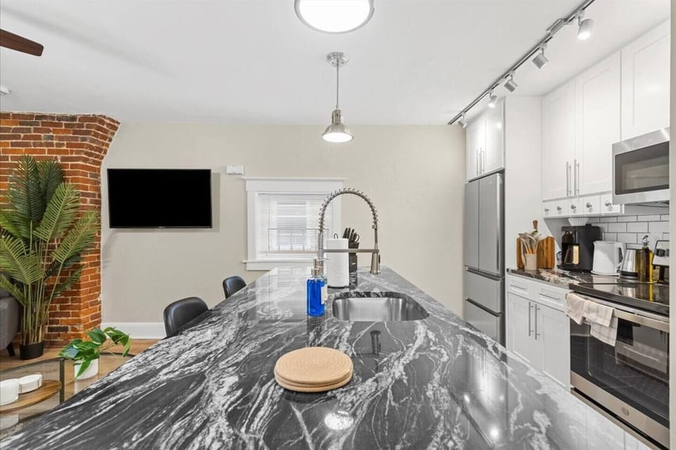 Start your mornings right with coffee and comfort in this inviting kitchen.