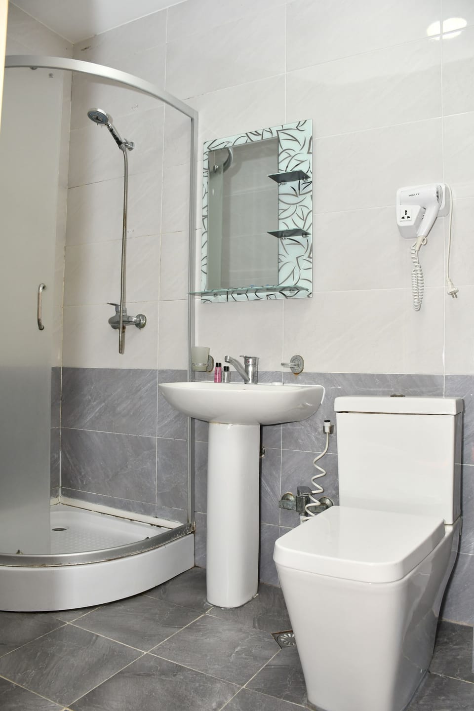 Classic Double Room, City View | Bathroom | Shower, free toiletries, hair dryer, slippers