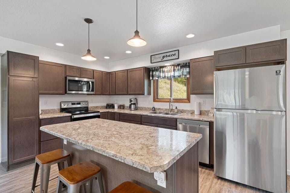 The fully equipped kitchen includes everything needed for home-style cooking!