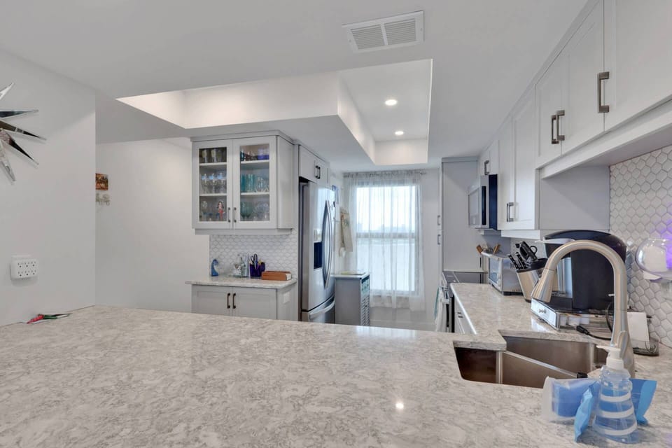 Thoughtfully stocked for your stay, the kitchen makes vacation dining easy—whether you're serving takeout or cooking together at home.
