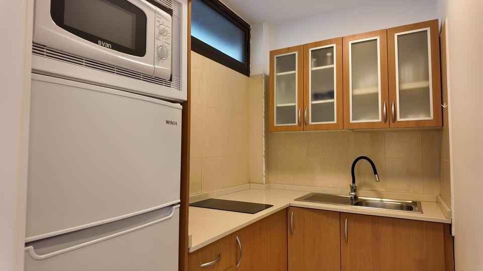 Apartment, Pool View | Private kitchen | Espresso maker, coffee/tea maker, microwave, cookware/dishes/utensils