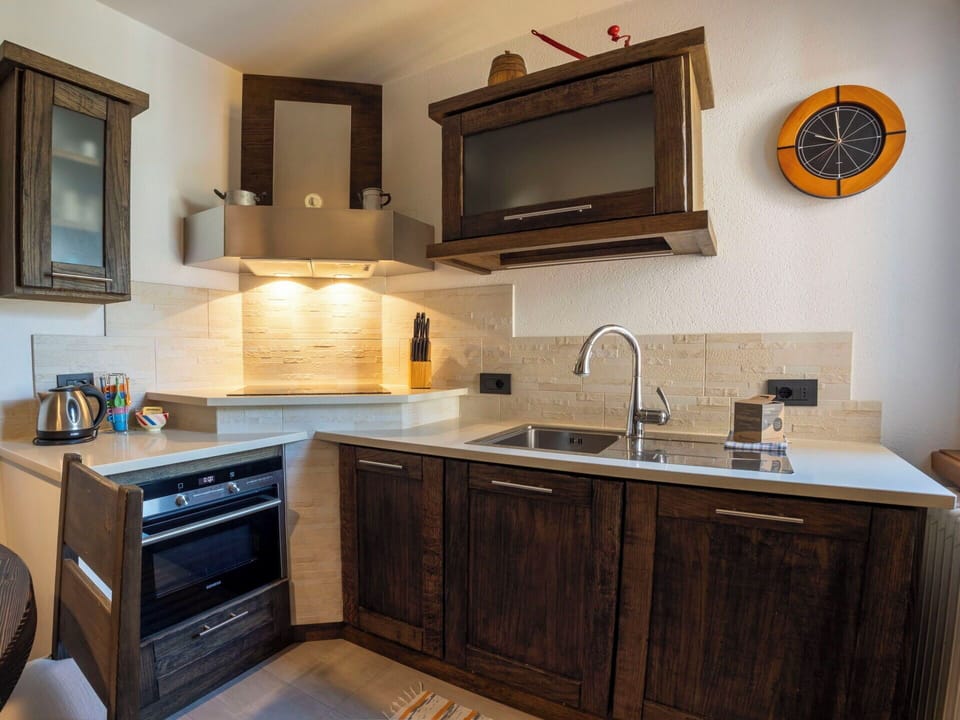 Kitchen, Furniture, Countertop, Cabinetry, Wood, Kitchen Appliance, Interior Design, Flooring, Major Appliance, Cupboard