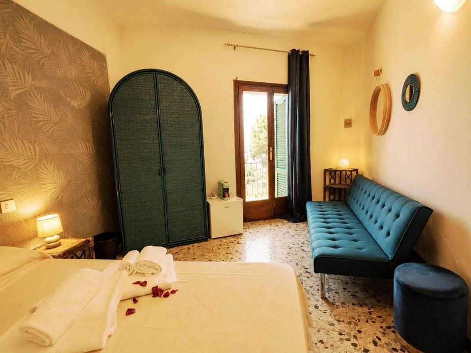 Luxury Triple Room, Sea View | Premium bedding, down comforters, memory foam beds, minibar