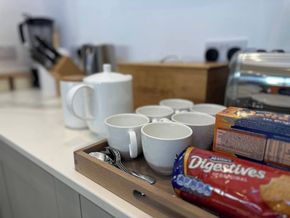 The kitchen is stocked with a number of teas. 