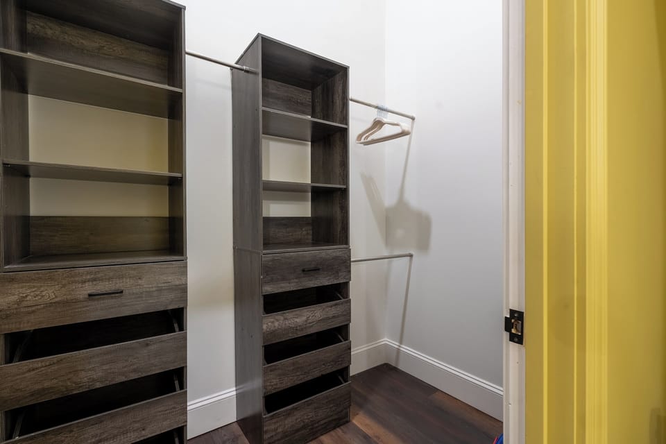 Walk in closet in en-suite bathroom