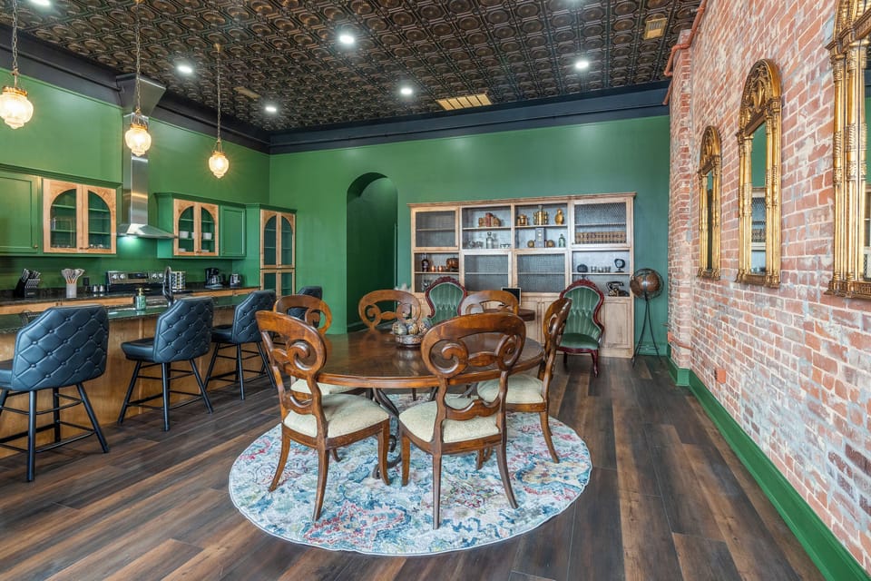 4 seats at the dining room table and 4 breakfast bar seats