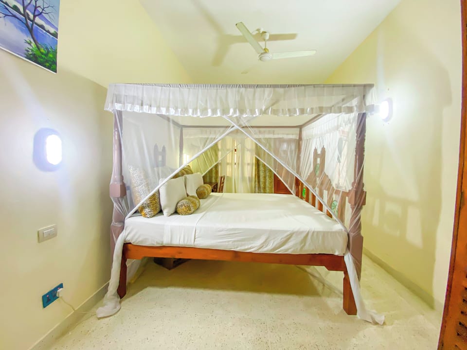 Comfort Villa, 2 Bedrooms, Patio, Garden View | Iron/ironing board, WiFi (free)