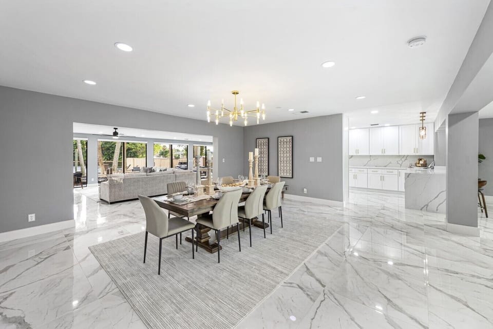 Expansive open floor plan connecting the formal dining space and spacious living area
