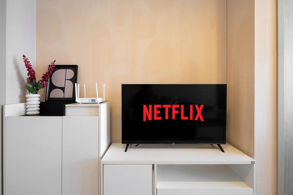 Cozy modern TV corner with Netflix and sleek minimalist styling