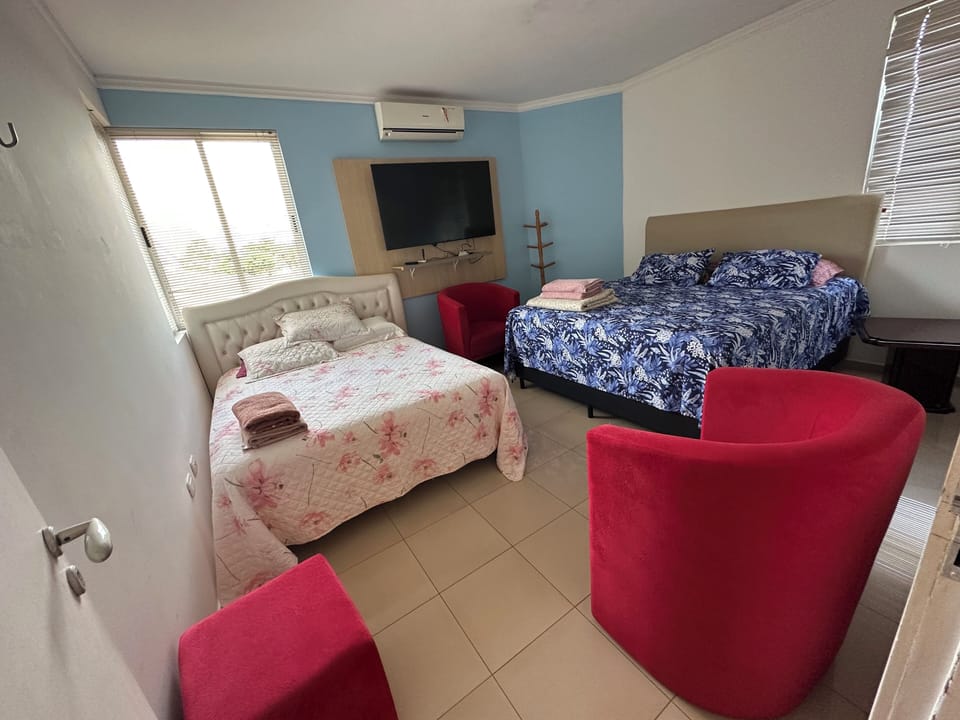 Family Double or Twin Room, Courtyard View | Blackout drapes, iron/ironing board, free WiFi