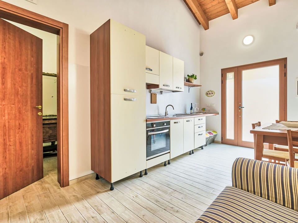 Interior Design, Apartment, Balcony, Hardwood, Wood Stain, Wood Flooring, Handrail, Daylighting, Hotel, Penthouse Apartment