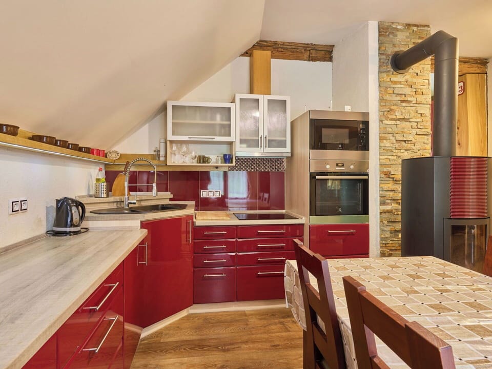 Kitchen, Interior Design, Furniture, Flooring, Countertop, Wood, Floor, Cabinetry, Ceiling, Kitchen Appliance