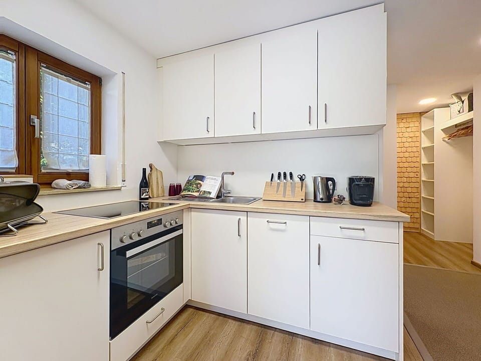 Kitchen, Kitchen Appliance, Countertop, Interior Design, Furniture, Flooring, Major Appliance, Wood, Cabinetry, Floor