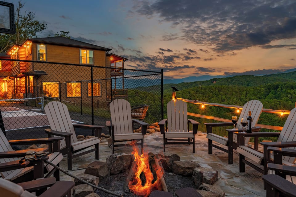 Cozy fire pit patio with sunset mountain views and warm evening ambiance