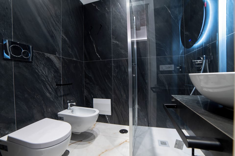 Deluxe Triple Room, City View | Bathroom | Shower, hair dryer, towels, soap