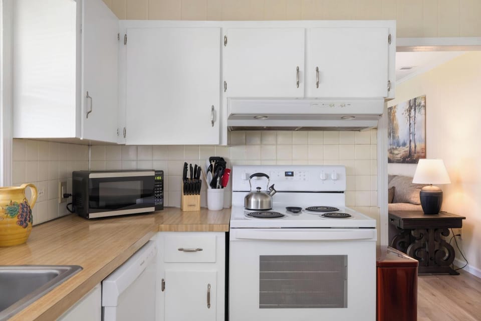 Bright, well-equipped kitchen with ample counter space and cozy flow