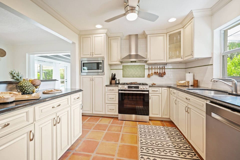 Fully equipped kitchen with modern appliances and ample space for meal preparation