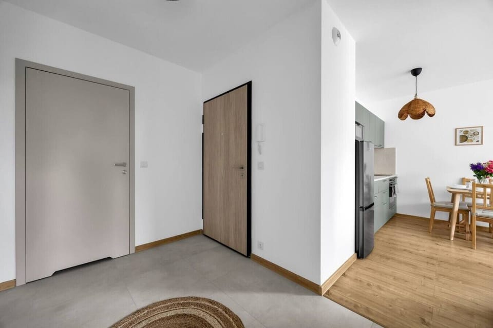 Welcoming Entryway with Modern Design and Direct Access to the Living Area | Book Now with RENTUJEMY.COM