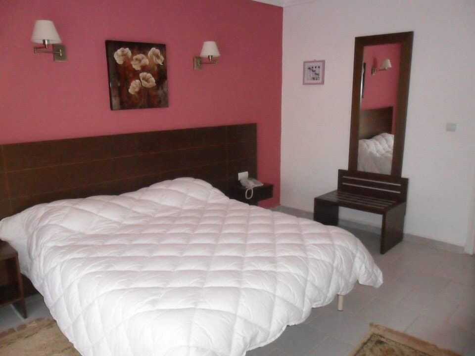 Double or Twin Room | Minibar, in-room safe, desk, blackout drapes