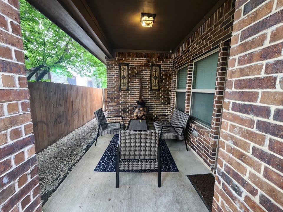 Fenced in patio for fellowshipping & fresh air. Located on the side of the home.