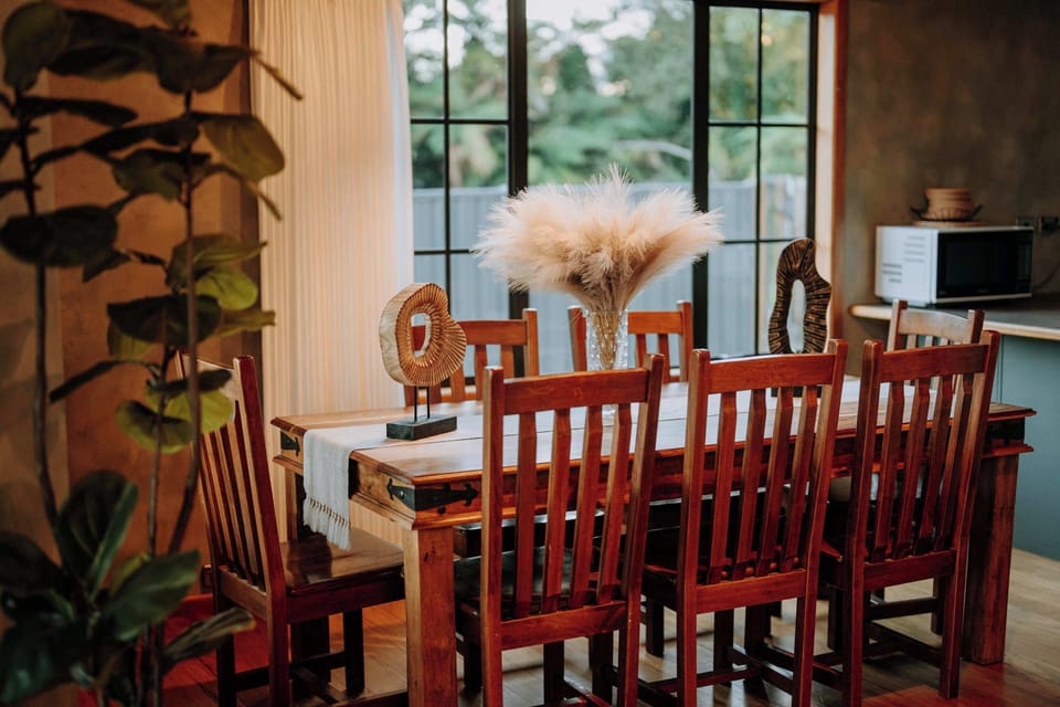 Dining setting with mahogany chairs