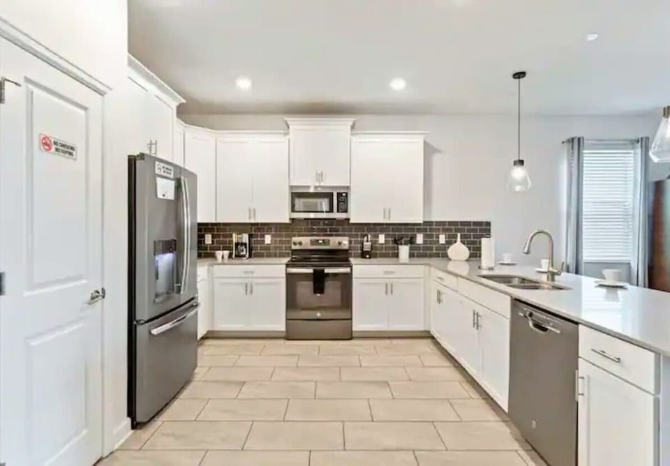 Spacious Kitchen: Modern appliances await your culinary adventures in this stylish space!