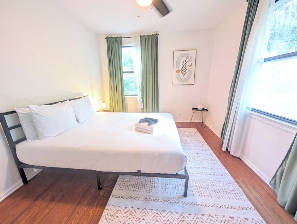 Well lit guest bedroom