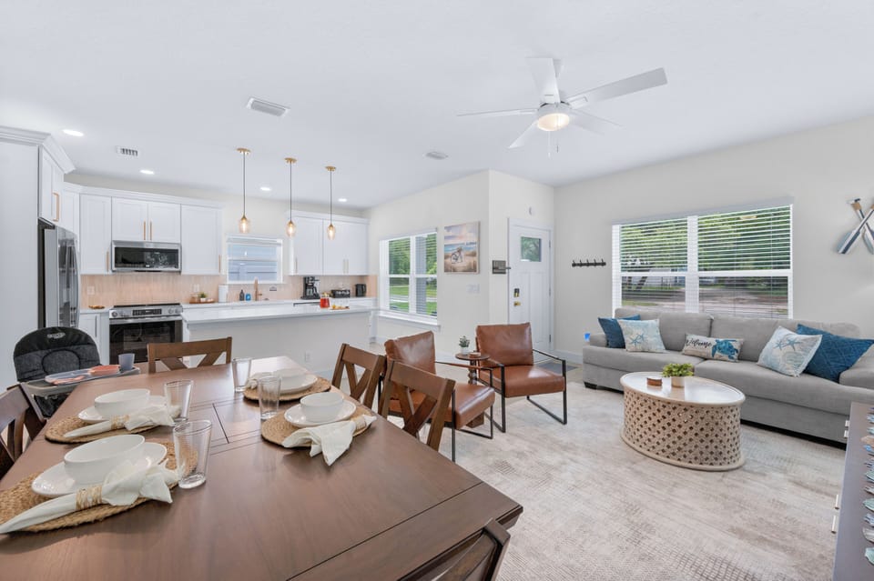 Spacious dining for six with open flow to the living room and kitchen