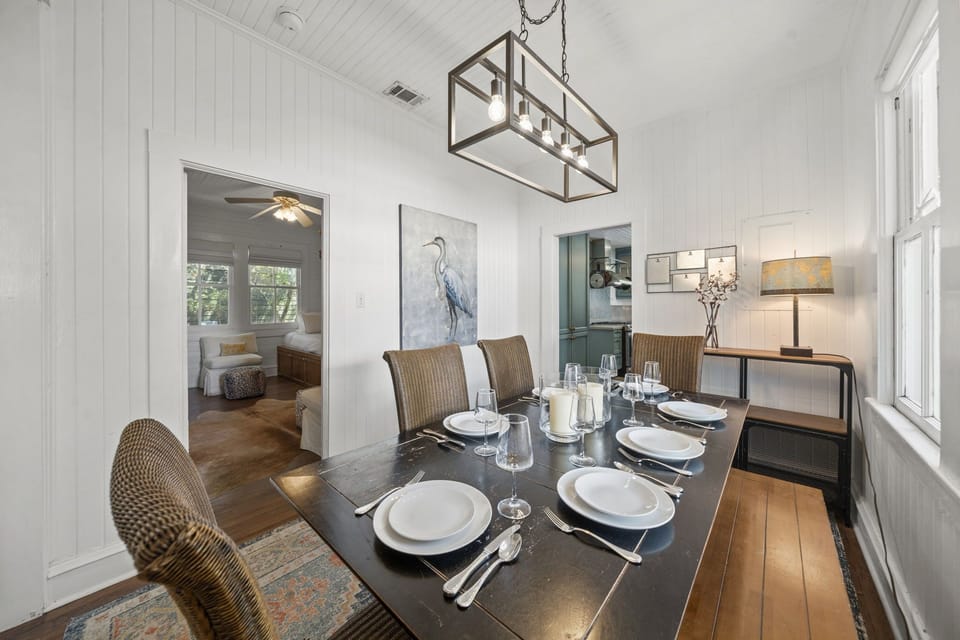 Family dinners come easy here, with a dining table for six set right between the kitchen and living room.
