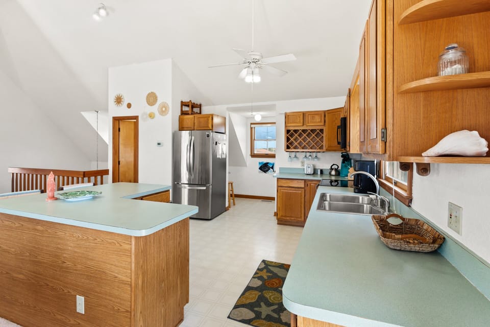 The well-equipped kitchen makes preparing family meals simple and convenient.