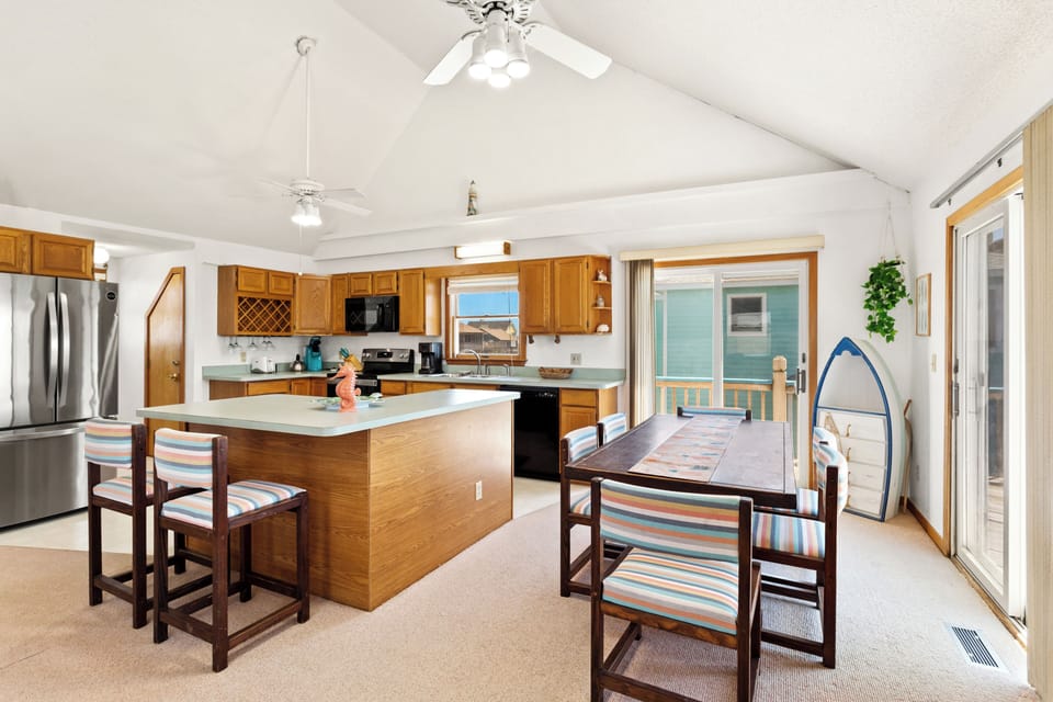 Vaulted ceilings and abundant natural light create a bright, inviting gathering space.