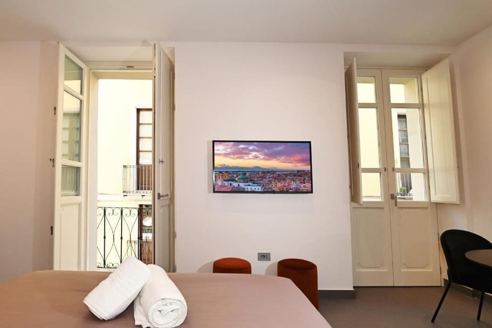 Superior Double Room, Balcony, City View | In-room safe, desk, laptop workspace, soundproofing