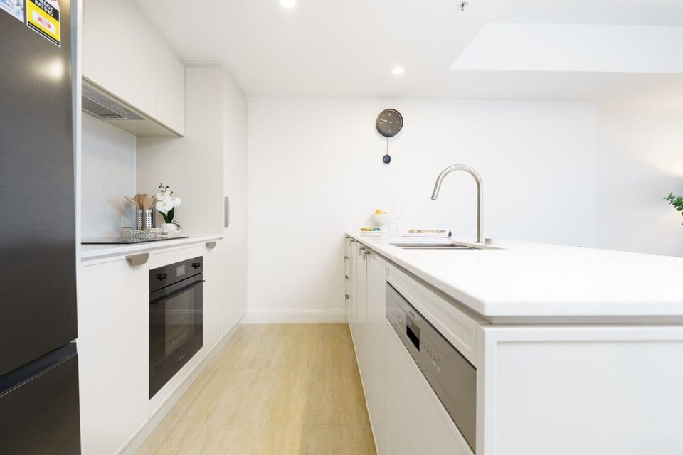 Cook with ease in the sleek, fully equipped kitchen, thoughtfully designed with modern appliances and plenty of bench space.