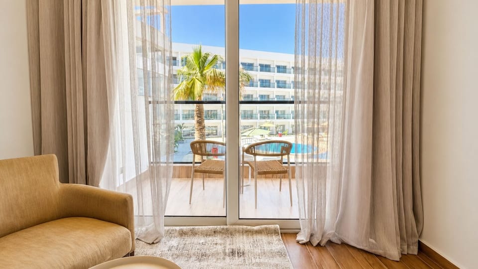 Superior Double or Twin Room, Balcony, Sea View | Minibar (some free items), in-room safe, blackout drapes