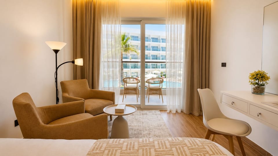 Superior Double or Twin Room, Balcony, Sea View | Minibar (some free items), in-room safe, blackout drapes