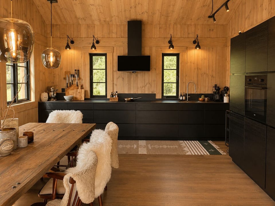 Fully equipped kitchen with cooking essentials and comfortable dining space with seating for the whole family.
