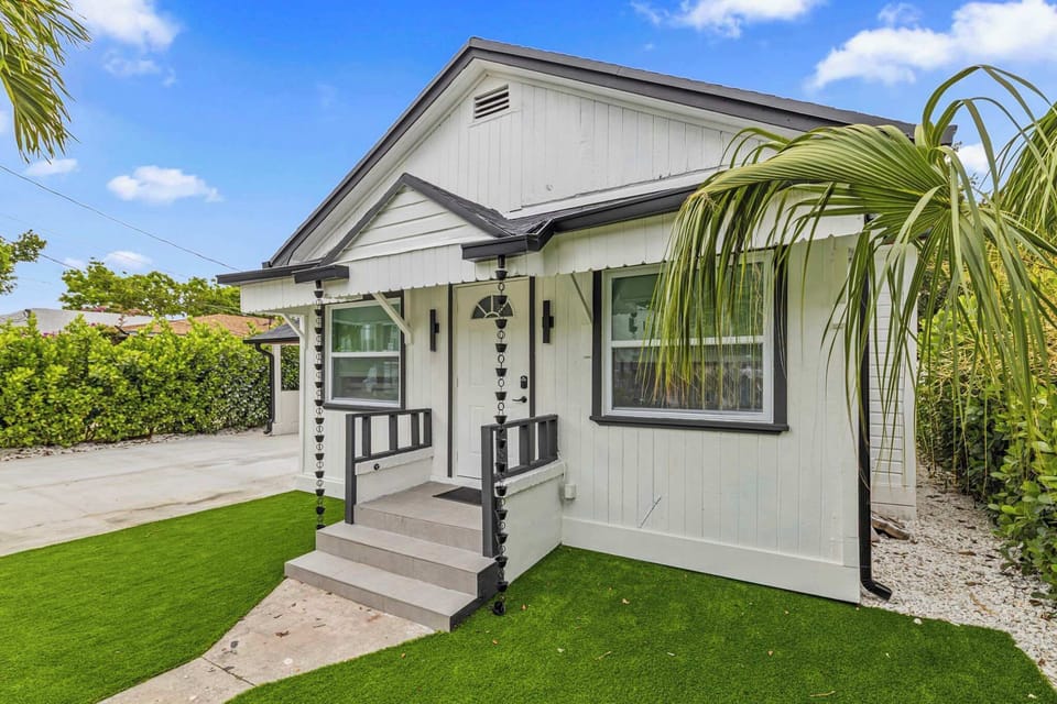 The property is located behind this primary house.