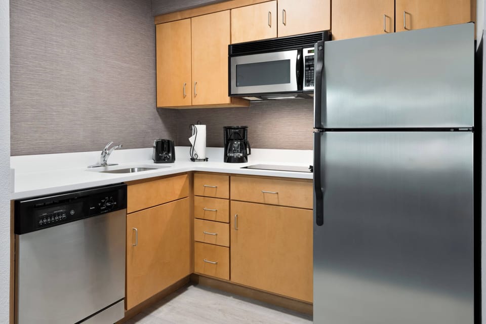 Studio, 1 King Bed with Sofa bed | Private kitchen | Fridge, microwave, stovetop, dishwasher