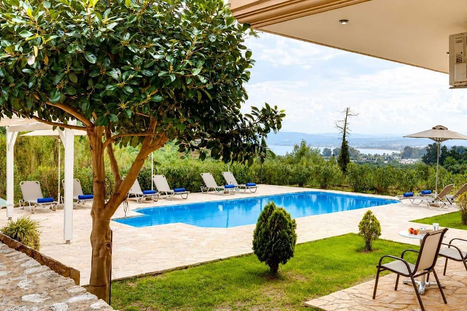 Relax in the landscaped gardens overlooking the shared pool and surrounding countryside.