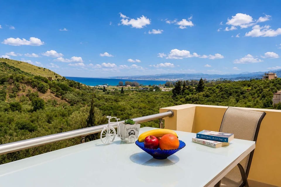 Start your day with breakfast overlooking the beautiful landscape and distant sea views from your private balcony.