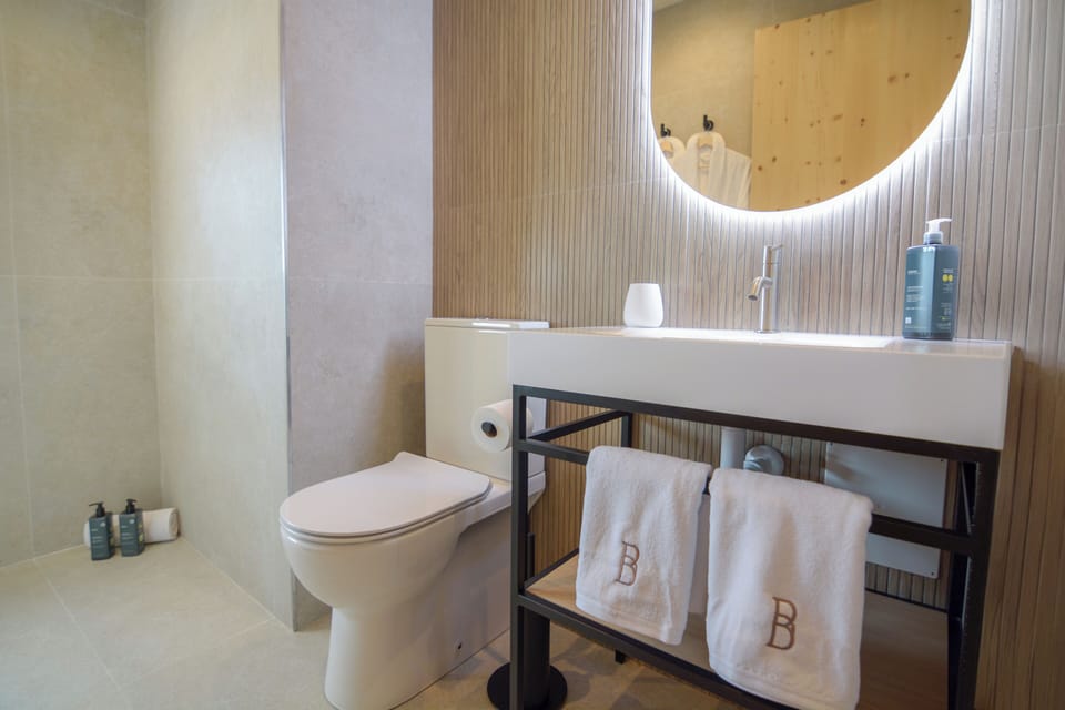 Standard Suite, Mountain View | Bathroom | Shower, hair dryer, heated floors, towels