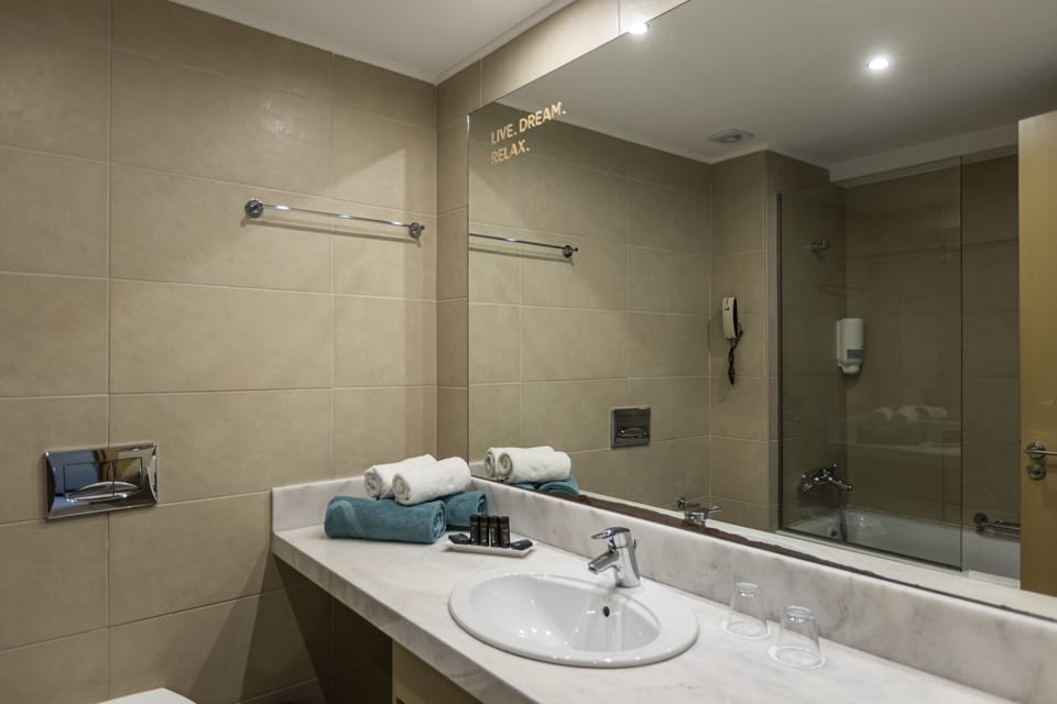 Hair dryer, bathrobes, slippers, towels